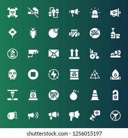 warning icon set. Collection of 36 filled warning icons included No alcohol, Megaphone, Bomb, Door hanger, Cone, No weapons, Siren, Laser, Fire, Bolt, Radioactive, Stop, Skull