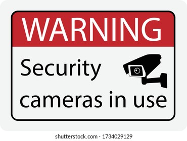 Warning Security cameras in use sign