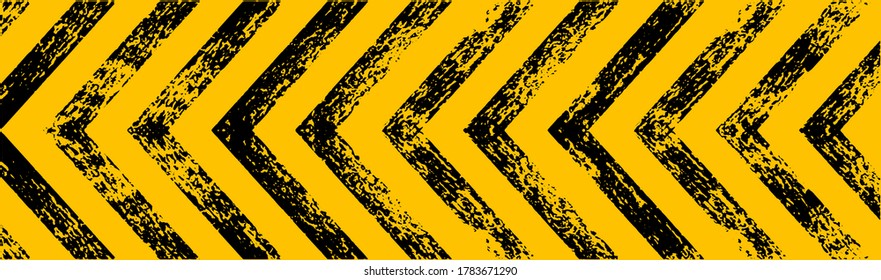 warning sign with black stripes on yellow background.