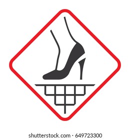 Warning sign that a high heel broken or get stuck. Grating, paving stones and tiles on the pedestrian zone.