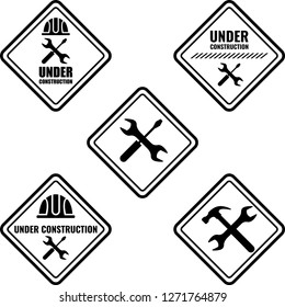 Warning sign under construction. Logo concept. Conceptual image of tools for repair, construction and builder. Cartoon flat illustration. Objects isolated on a background.