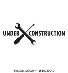 warning text: under construction with crossed screwdriver and wrench tools illustration