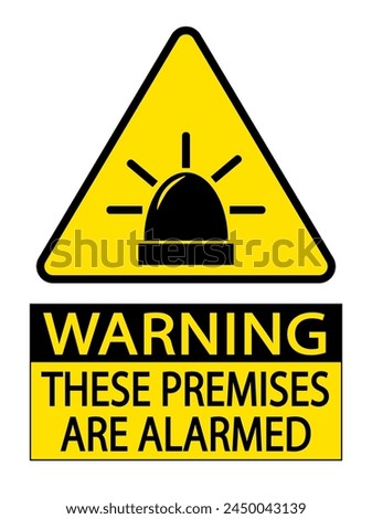 Warning, these premises are alarmed. Yellow triangle sign with silhouette of alarm siren sounding and text below.