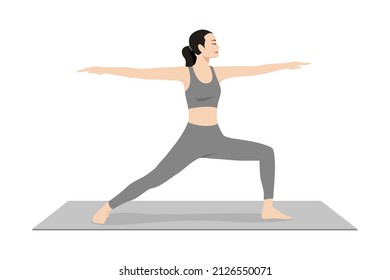 Warrior Pose II. Beautiful girl practice Virabhadrasana I. Young attractive woman practicing yoga exercise. working out, black wearing sportswear, grey pants and top, indoor full length calmness relax