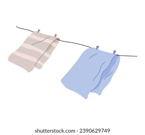Washed clothes, towels dry outside on stretched rope. Clothing and garment care, housekeeping concept. Professional cleaning of apparel. Drying laundry on clothesline isolated on white background