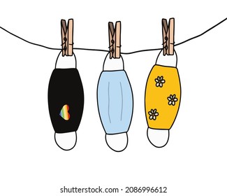 washed face masks clothespins on a clothesline. Colorful covid 19 covers. mask with lgbt heart symbol. vector.