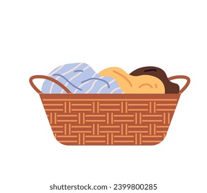 Washed wet laundry in basket. Dirty clothes, apparel heap. Pile of cotton clothing, laundry. Clothing and garment care, housekeeping concept. Basket with dirty textile, fabric or napkin for washing