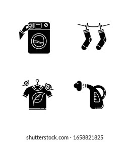Washing clothes black glyph icons set on white space. Washateria, coin laundry and steam cleaning service. Eco dry cleaning and outdoor drying. Silhouette symbols. Vector isolated illustration