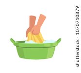 Washing clothes in green basin by hands, cleaning and housework concept vector Illustration on a white background