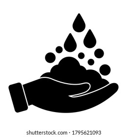 Washing hands with soap icon in trendy silhouette style design. Vector illustration isolated on white background.