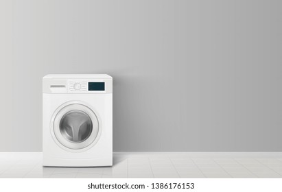 Washing machine front view on a white wall background