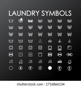 Washing symbols for clothes. Washing machine symbols for washing clothes. Washing instructions. Black background.