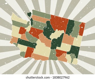 Washington vintage map. Grunge poster with map of the us state in retro color palette. Shape of Washington with sunburst rays background. Vector illustration.