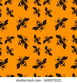 Wasps in black color. Wasp pattern. Seamless vector pattern with insects, symmetrical background with wasps in black color isolated on orange background.