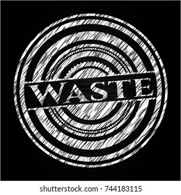Waste chalk emblem written on a blackboard