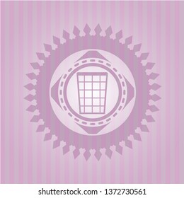 wastepaper basket icon inside badge with pink background