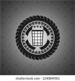 wastepaper basket icon inside black badge
