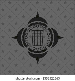 wastepaper basket icon inside black badge