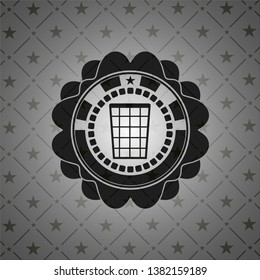 wastepaper basket icon inside black emblem
