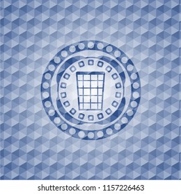 wastepaper basket icon inside blue emblem or badge with geometric pattern background.