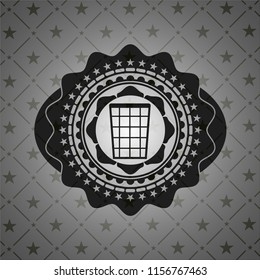 wastepaper basket icon inside dark emblem