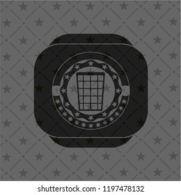 wastepaper basket icon inside dark badge or emblem