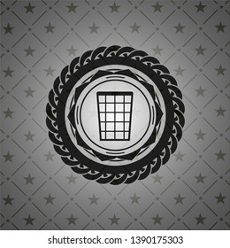wastepaper basket icon inside dark emblem. Retro