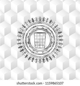 wastepaper basket icon inside grey badge with geometric cube white background