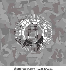 wastepaper basket icon inside grey camo texture