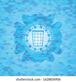 wastepaper basket icon inside light blue emblem with triangle mosaic background