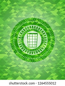 wastepaper basket icon inside realistic green mosaic emblem