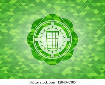 wastepaper basket icon inside realistic green emblem. Mosaic background
