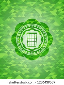 wastepaper basket icon inside realistic green mosaic emblem