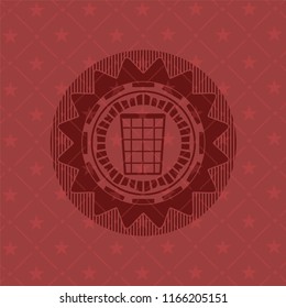 wastepaper basket icon inside red emblem