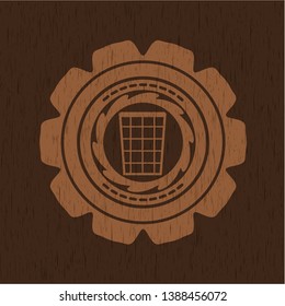 wastepaper basket icon inside retro style wood emblem