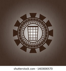 wastepaper basket icon inside retro wood emblem