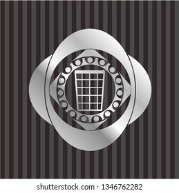 wastepaper basket icon inside silver emblem