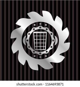 wastepaper basket icon inside silvery badge or emblem