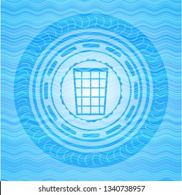 wastepaper basket icon inside sky blue water style emblem.