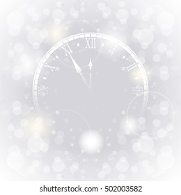 Watch showing five minutes to midnight. Happy New Year greeting card. Sparkling background with bokeh.