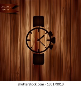 Watch,clock icon.Wooden background
