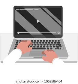 Watching video on laptop