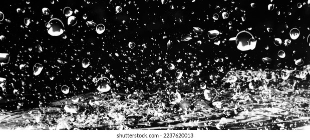 Water and bubbles background for cards, flyer, poster, banner and cover design. Drops on black backdrop. Monochrome vector close-up illustration with liquid and bubbles.