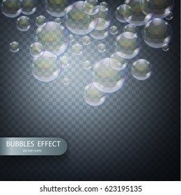 Water bubbles isolated on a transparent checkered background. Iridescent soap bubbles with reflex and reflection, realistic vector effect