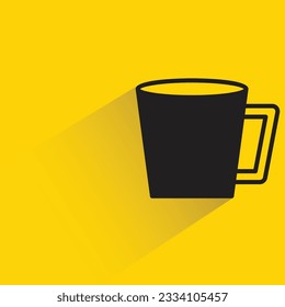 water cup with shadow on yellow background