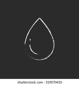 Water drop hand drawn in chalk on a blackboard vector white icon isolated on a black background.