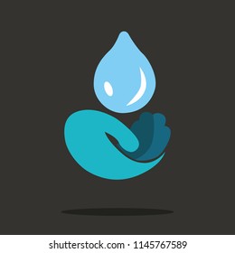 water drop shape blue and hand isolated on dark background, water droplet in hand flat icon, water droplet symbol over hand. Save the water concept.