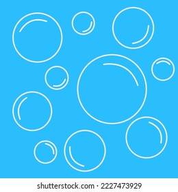 water droplets of various sizes on a blue background.