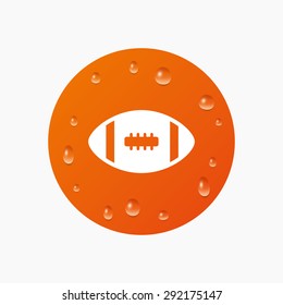 Water drops on button. American football sign icon. Team sport game symbol. Realistic pure raindrops. Orange circle. Vector