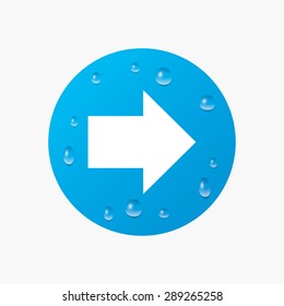 Water drops on button. Arrow sign icon. Next button. Navigation symbol. Realistic pure raindrops. Blue circle. Vector